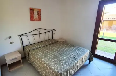 Letto o letti in una camera di ISS Travel, Le Carrube two bedrooms apartments with air conditioning