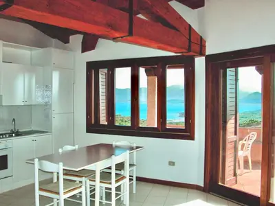 Cucina o angolo cottura di ISS Travel, Panoramic Coda Cavallo Cottages - 10 km from San Teodoro