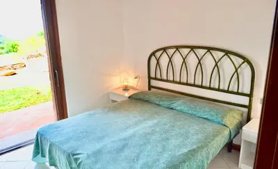 Letto o letti in una camera di ISS Travel, Panoramic Coda Cavallo Cottages - 10 km from San Teodoro
