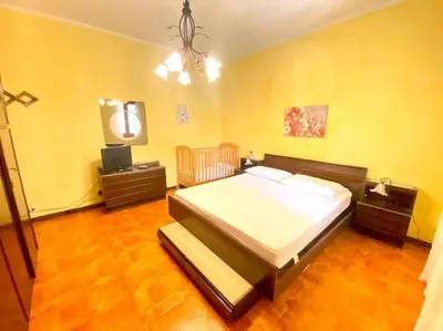 Letto o letti in una camera di Villa Fiorita