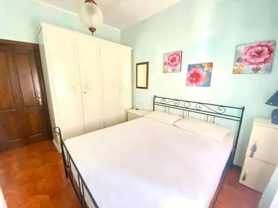 Letto o letti in una camera di Villa Fiorita