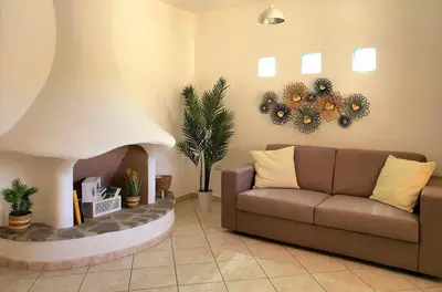 Area soggiorno di La casa di Mara - Appartamento in zona residenziale a pochi minuti da Cala Liberotto