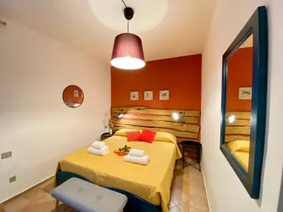 Letto o letti in una camera di Residence La Rosa