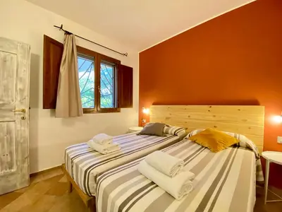 Letto o letti in una camera di Residence La Rosa