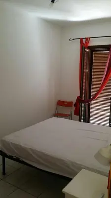 Letto o letti in una camera di Casa vista mare golfo di Budoni