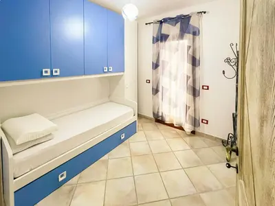 Letto o letti in una camera di Stella Marina 2