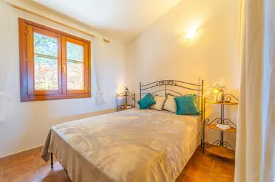 Letto o letti in una camera di Rosa dei Venti by DomusAway