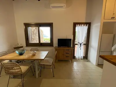 TV o dispositivi per l'intrattenimento presso Villetta con vista mozzafiato