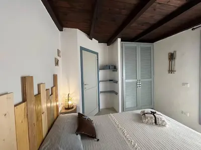 Letto o letti in una camera di Villetta con vista mozzafiato