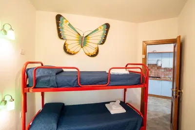 Letto o letti in una camera di Domus meravizosas 1