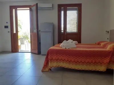 Letto o letti in una camera di Barrumbas