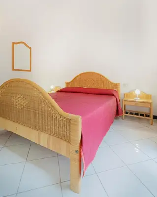 Letto o letti in una camera di AMBRA Holiday Rooms