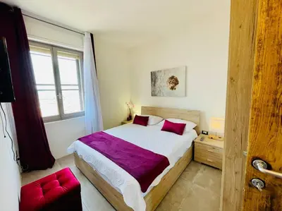 Letto o letti in una camera di Smeralda Sea View - Luxury Apartment