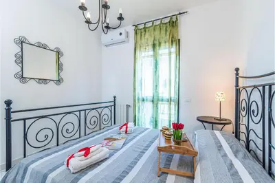 Letto o letti in una camera di Trilo Debora 2Km From The Beach - Happy Rentals
