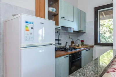 Cucina o angolo cottura di Trilo Debora 2Km From The Beach - Happy Rentals