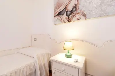 Letto o letti in una camera di Rustico degli Ulivi