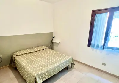 Letto o letti in una camera di ISS Travel, Gli Asfodeli - Large apartments with private terrace