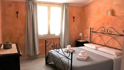 Letto o letti in una camera di Country villa Sant' Elène - Appartamento Olivo