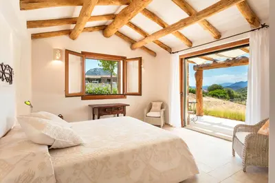 Letto o letti in una camera di Albero Capovolto