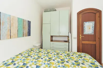 Letto o letti in una camera di LA CASA DI LINDA