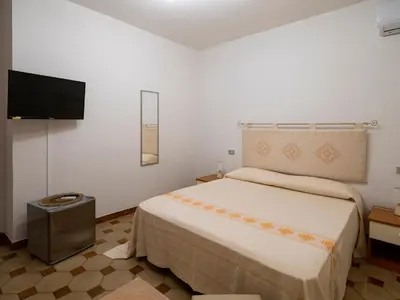 Letto o letti in una camera di B&B Da Laura San Teodoro