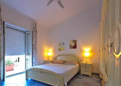 Letto o letti in una camera di Villa Arancio