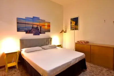 Letto o letti in una camera di Villa Arancio