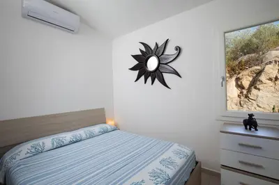 Letto o letti in una camera di Casa Perla by Wonderful Italy