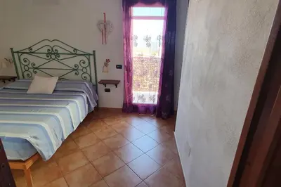 Letto o letti in una camera di Casa Lepora