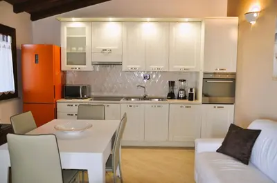 Cucina o angolo cottura di Villa Nadia con piscina privata Budoni