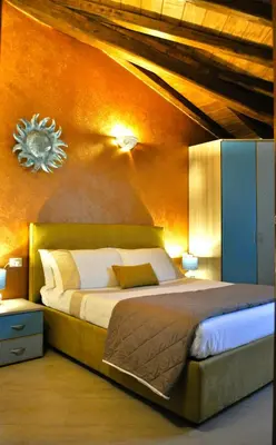Letto o letti in una camera di Villa Nadia con piscina privata Budoni