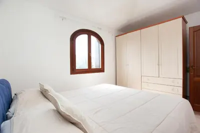 Letto o letti in una camera di Villino Funtana 2