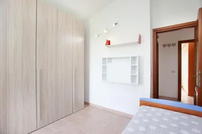 Letto o letti in una camera di Villino Funtana 2
