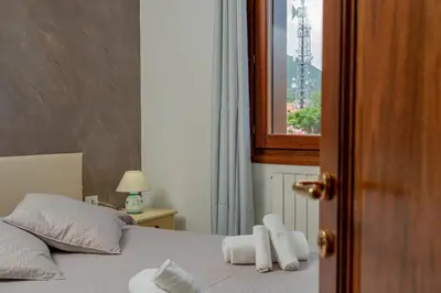 Letto o letti in una camera di Rooms Tavolara