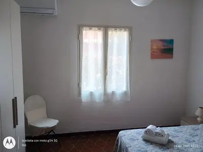 Letto o letti in una camera di La Terrazza Di Chiara