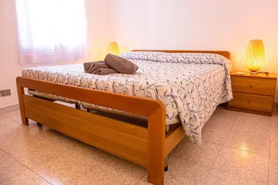 Letto o letti in una camera di Casa Lucy del Mare - Cala Gonone