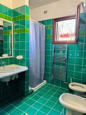 Bagno di Comoda villetta con giardino