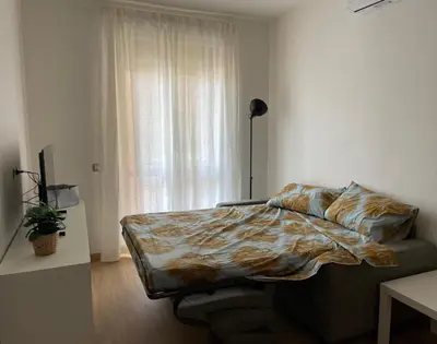 Letto o letti in una camera di Accogliente bilocale in centro a Olbia