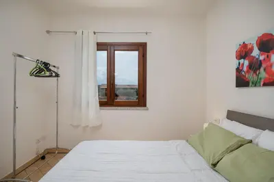 Letto o letti in una camera di Myrsine 2 by Wonderful Italy