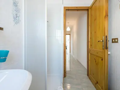 Letto o letti in una camera di CASA CELESTE CALA GONONE