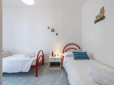 Letto o letti in una camera di CASA CELESTE CALA GONONE