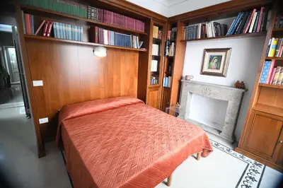 Letto o letti in una camera di Domo Peonia Bianca