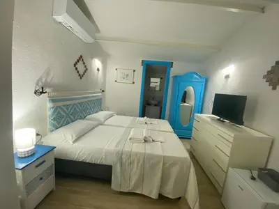 Letto o letti in una camera di Da Tea