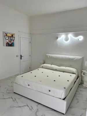 Letto o letti in una camera di Da Tea