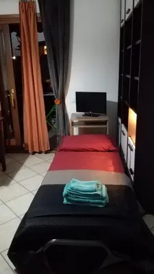 Letto o letti in una camera di La casa di Asia