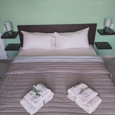 Letto o letti in una camera di La casa di Asia