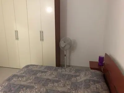 Letto o letti in una camera di Casa Vacanza Budoni Mare