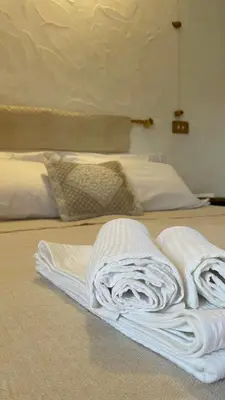 Letto o letti in una camera di Matta e Sole