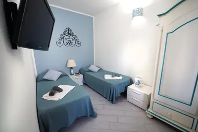 Letto o letti in una camera di Sardinian Cottage, 150m from the sea, private Garden