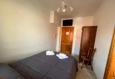 Letto o letti in una camera di S' Agrùstu